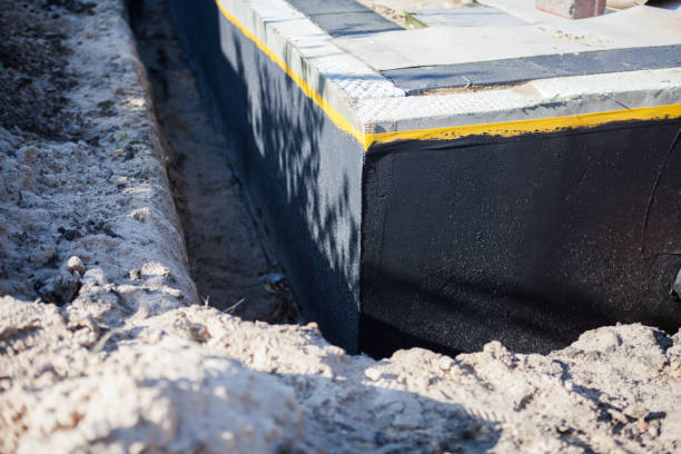 Professional Basement Waterproofing technician working in Spring Lake, MI